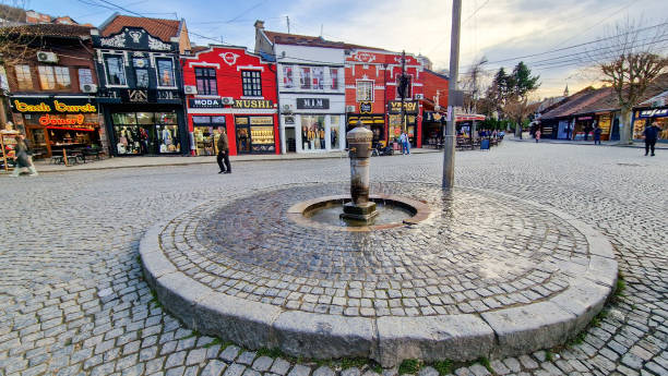 Shadervan Square in Prizren, Kosovo, a lively public square with a central fountain.